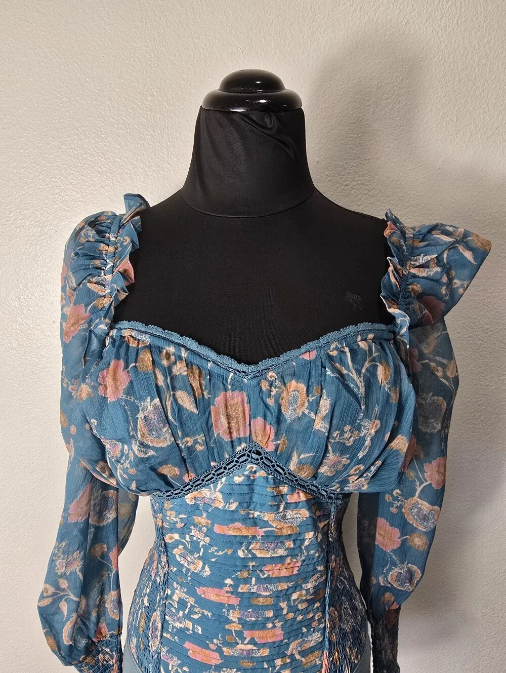 Free People Turquoise Floral Smocked  Long Sleeve Bodysuit.